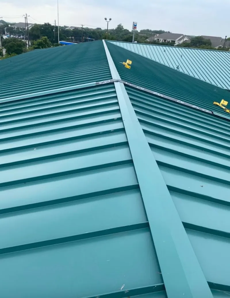 Green commercial metal roof ridge and valley for Metal Roof Repair in Cushing